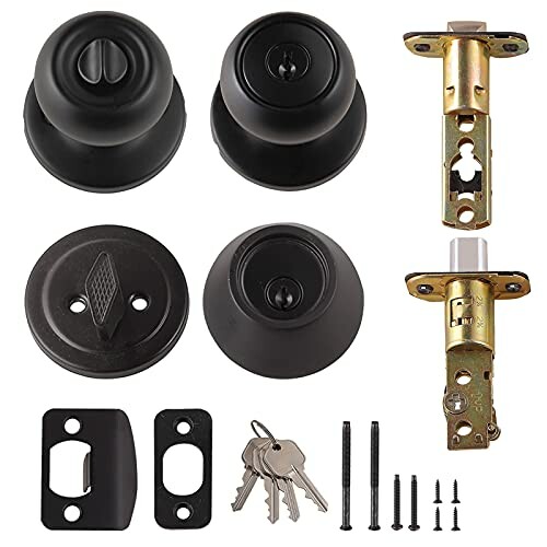 Door lock hardware set with knobs, latch, strike plates, and keys.