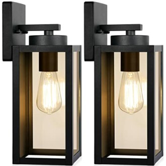 Pair of modern black wall sconce light fixtures with glass panels.